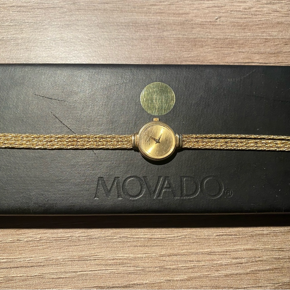 Authentic Movado gold bracelet watch with case